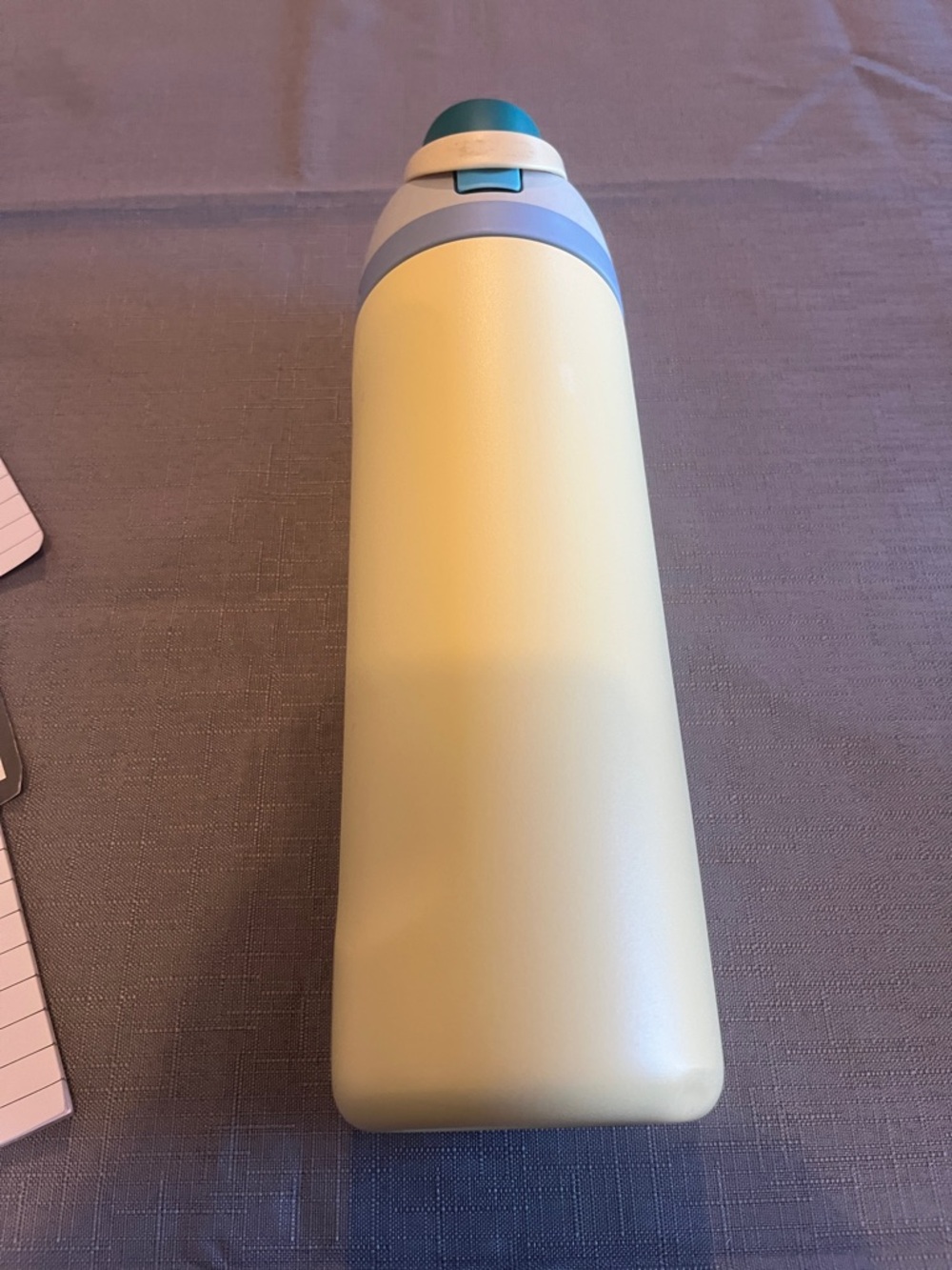 Insulated Pale Yellow Water Bottle with Blue Accent - Brand Unspecified